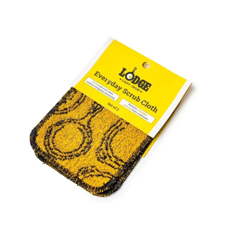 Black and yellow Lodge brush with sturdy bristles, ideal for cleaning and scrubbing tasks.