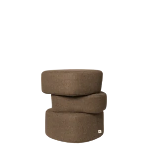 Plyo Pouf in dark brown, three stacked rounded volumes in woven upholstery