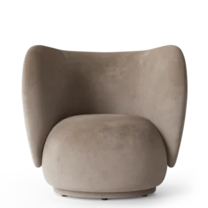 Rico Lounge Chair in beige faded velvet with curved wraparound back