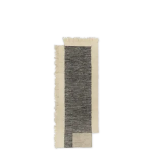 Counter Runner in charcoal and off-white with fringed edges, seen from above