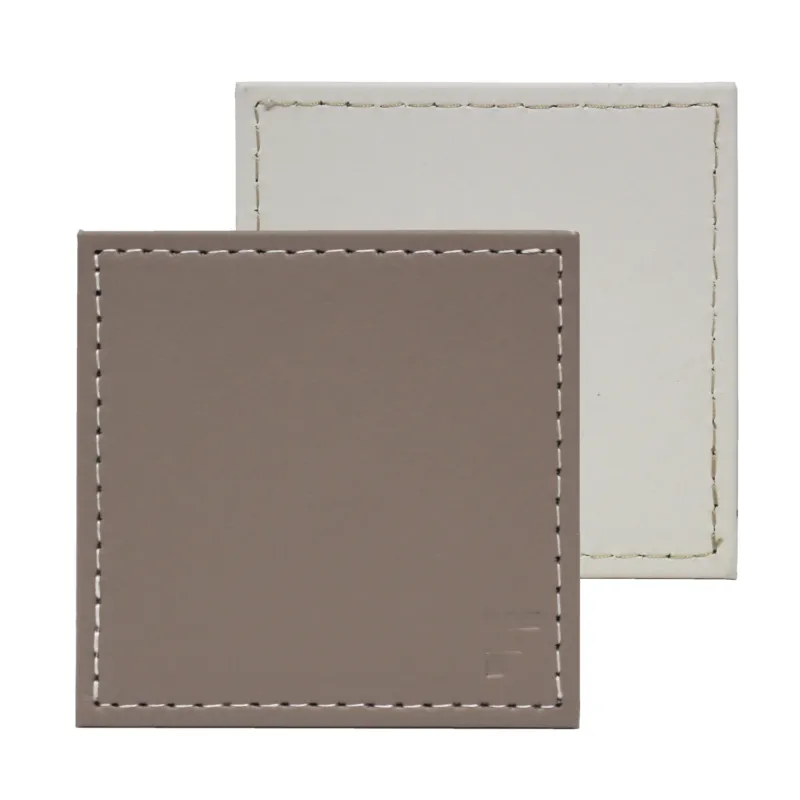 Set of four Freeform Untersetzer in white and taupe, stylish coasters for protecting surfaces from drink condensation.
