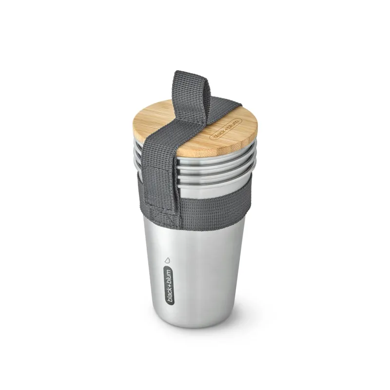 Black+Blum stainless steel TO-GO lunch becher-set with four reusable cups and lids for portable meals.
