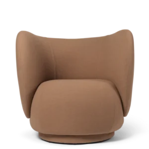 Rico Lounge Chair in tan with curved wingback and rounded seat
